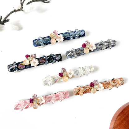 Petite Posy crystal velvet barrettes in champagne gold, frost clear white, blush pink, slate grey, noir black and sapphire navy blue