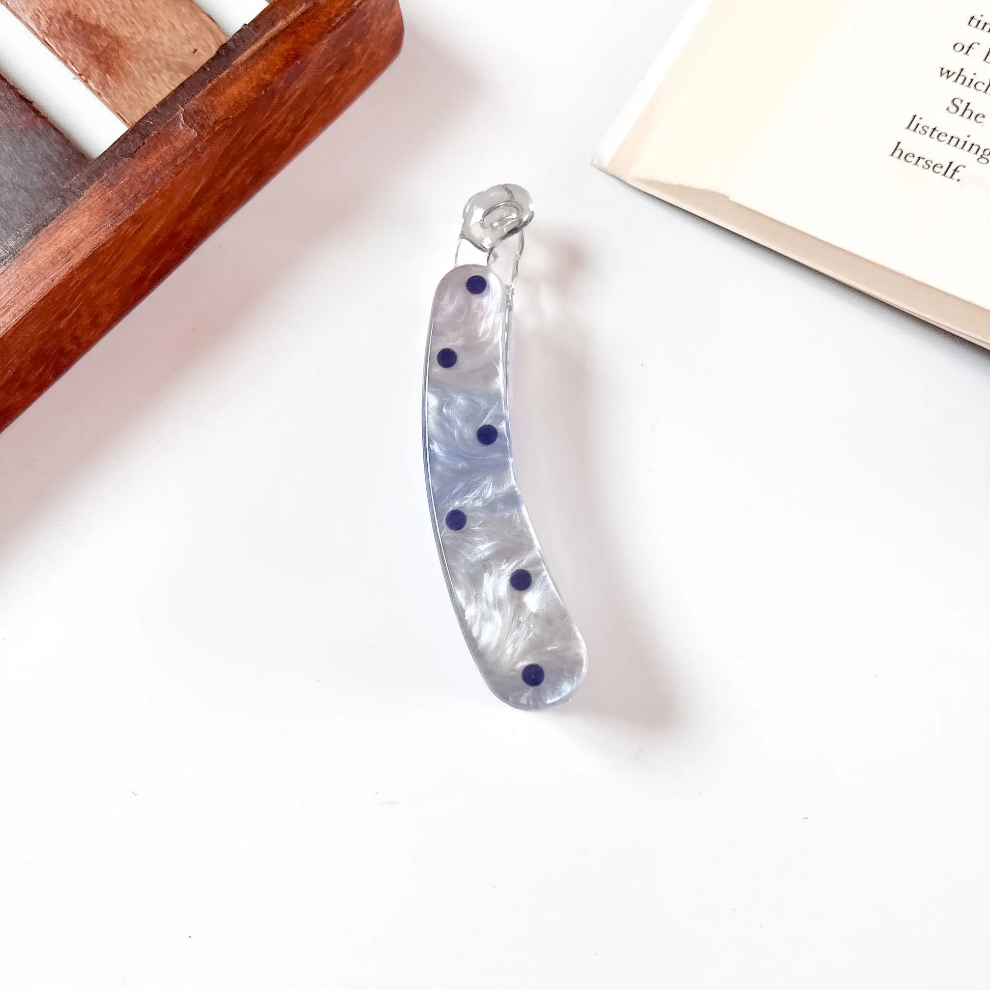 Blue pearl snap clip with navy polka dots