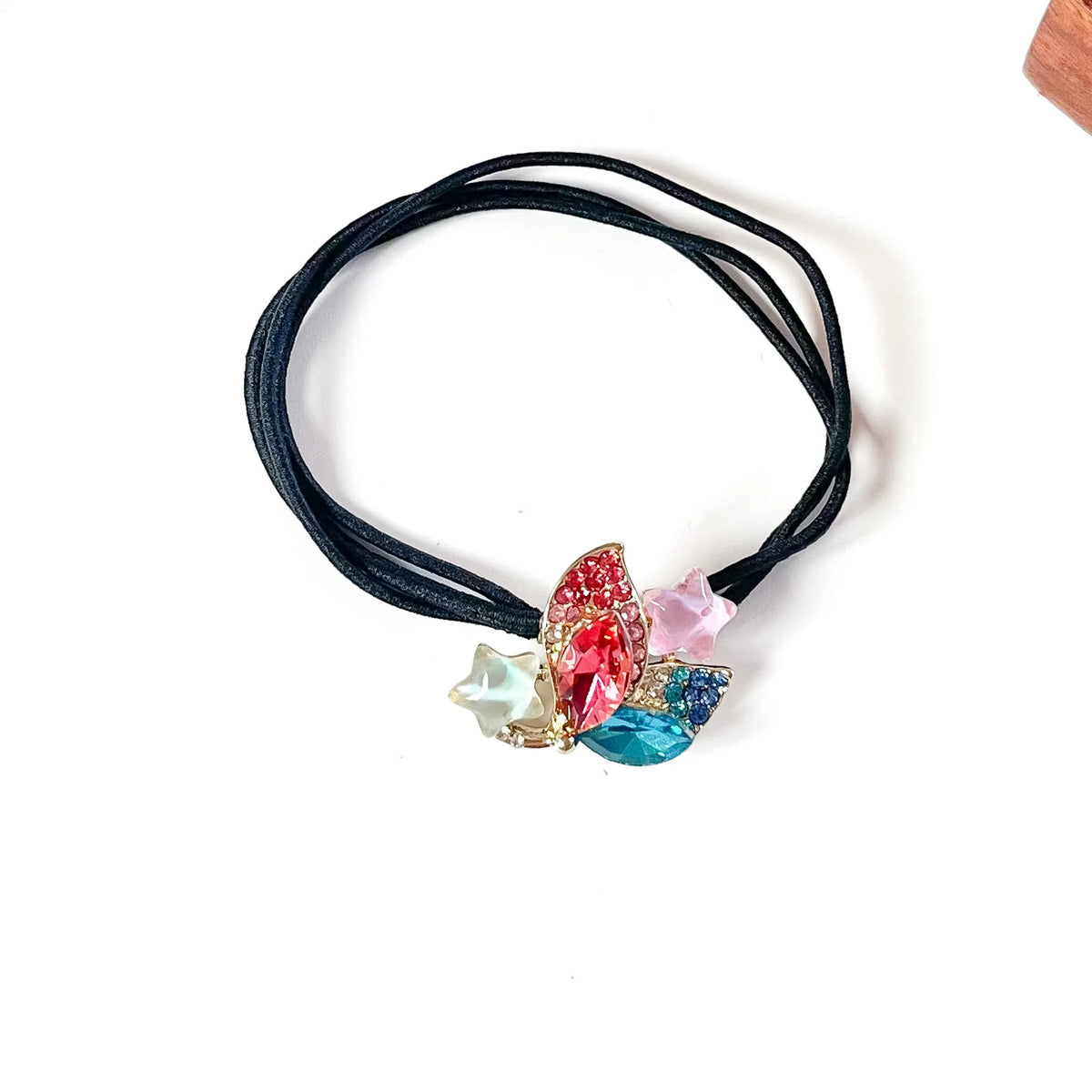 Prism multicolour fancy hair tie with pink and blue crystals and pastel star charms, jewelled hair elastic