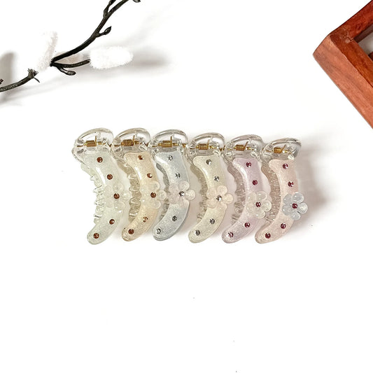 All 6 radiant flower clips: beige, white, peach, mauve, sage, grey with flower petals