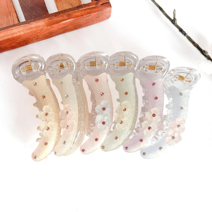All 6 radiant flower clips: beige, white, peach, mauve, sage, grey with flower petals