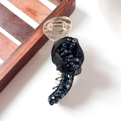 Black rosette crystal banana clip with organza fabric rose and crystal bead detail