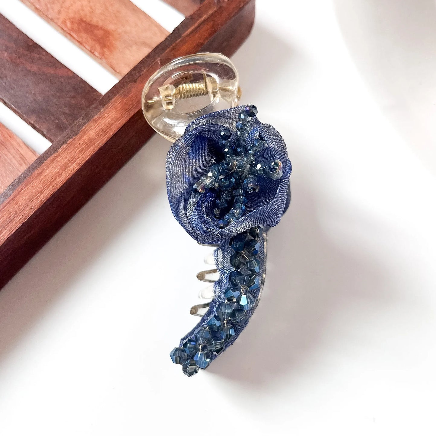 Navy blue rosette crystal banana clip with organza fabric rose and crystal bead cascade