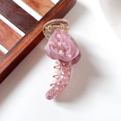Pink rosette crystal banana clip with organza fabric rose and crystal bead cascade