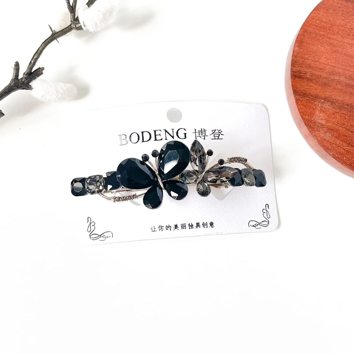 Noir black crystal butterfly barrette with smoky grey stones, an elegant fancy hair clip for buns