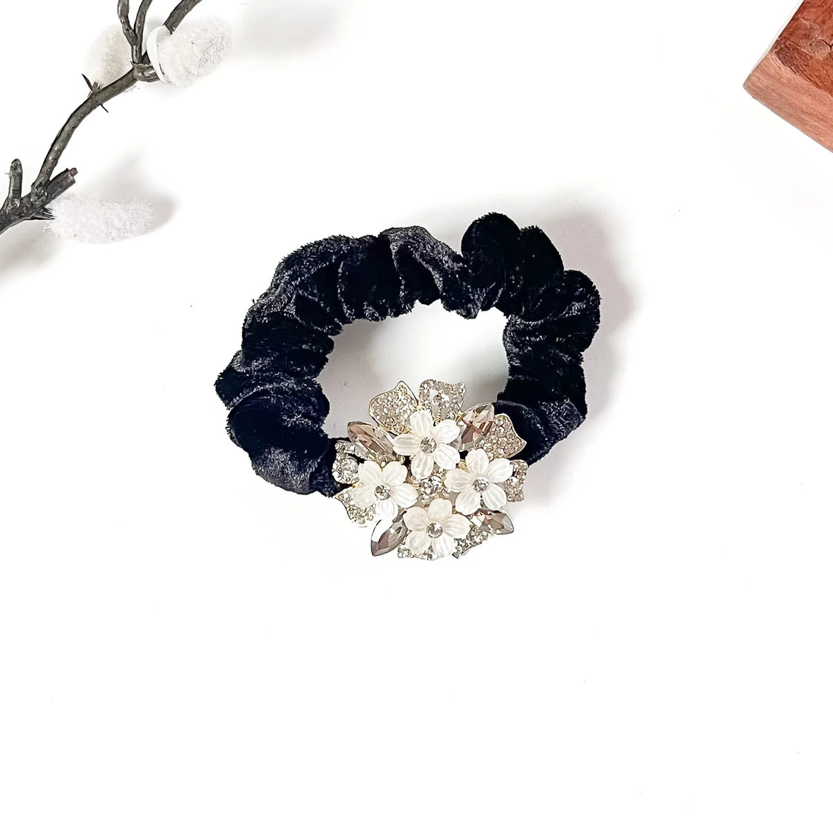 Black velvet scrunchie with smoke grey crystals and white flowers