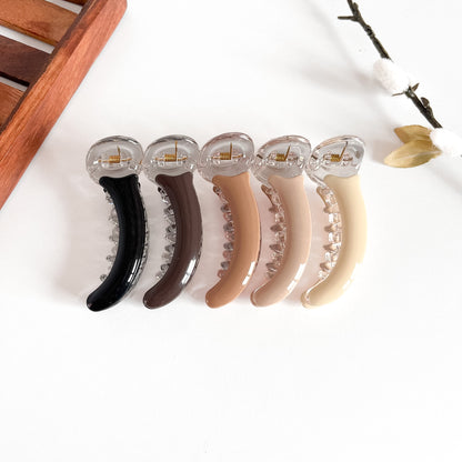 All 5 smooth gloss banana clips: black, burgundy, caramel, cream, ivory with polished finish
