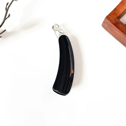 Black smooth gloss lock banana clip with polished finish and clear crystalline top, 8cm medium