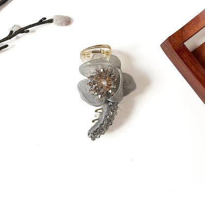 Starburst Bloom Banana Clip in silver grey, 8cm flower banana clip with smoky crystal burst