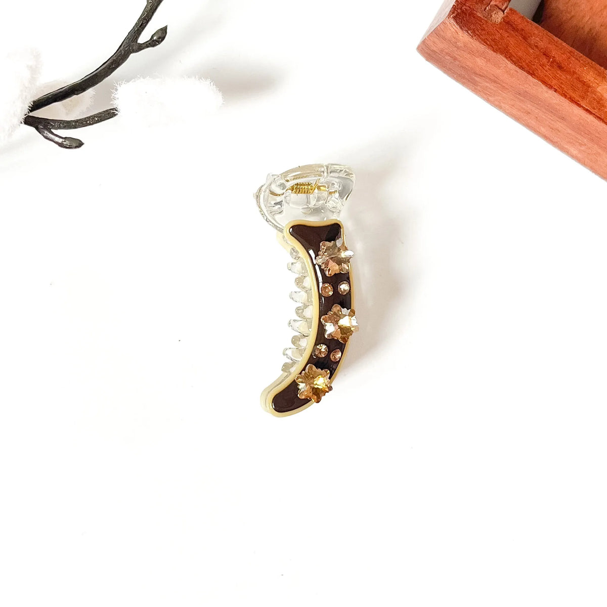 Cocoa dark brown mini banana clip with gold topaz star crystals, 5cm
