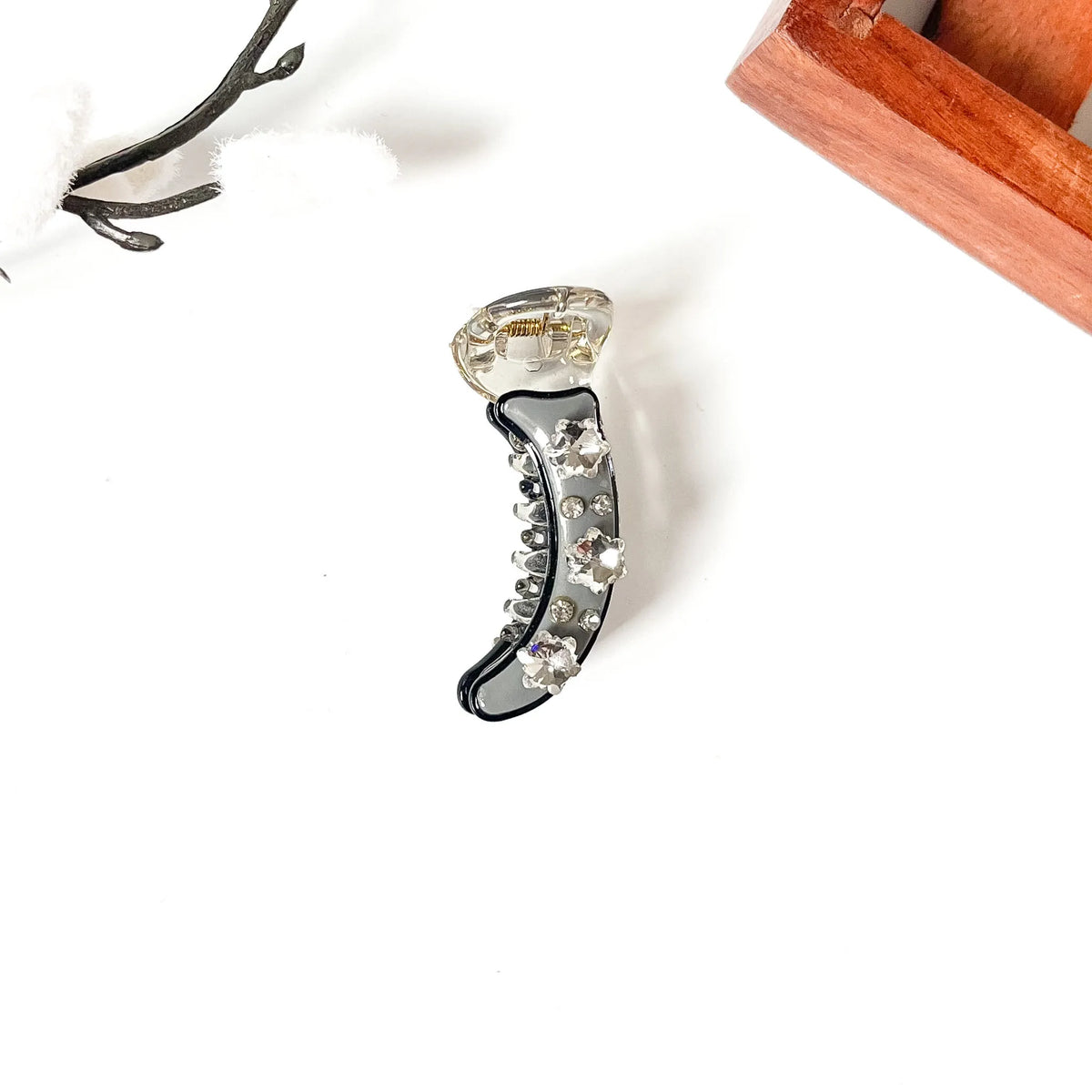 Slate grey mini banana clip with black edge and clear star crystals, 5cm