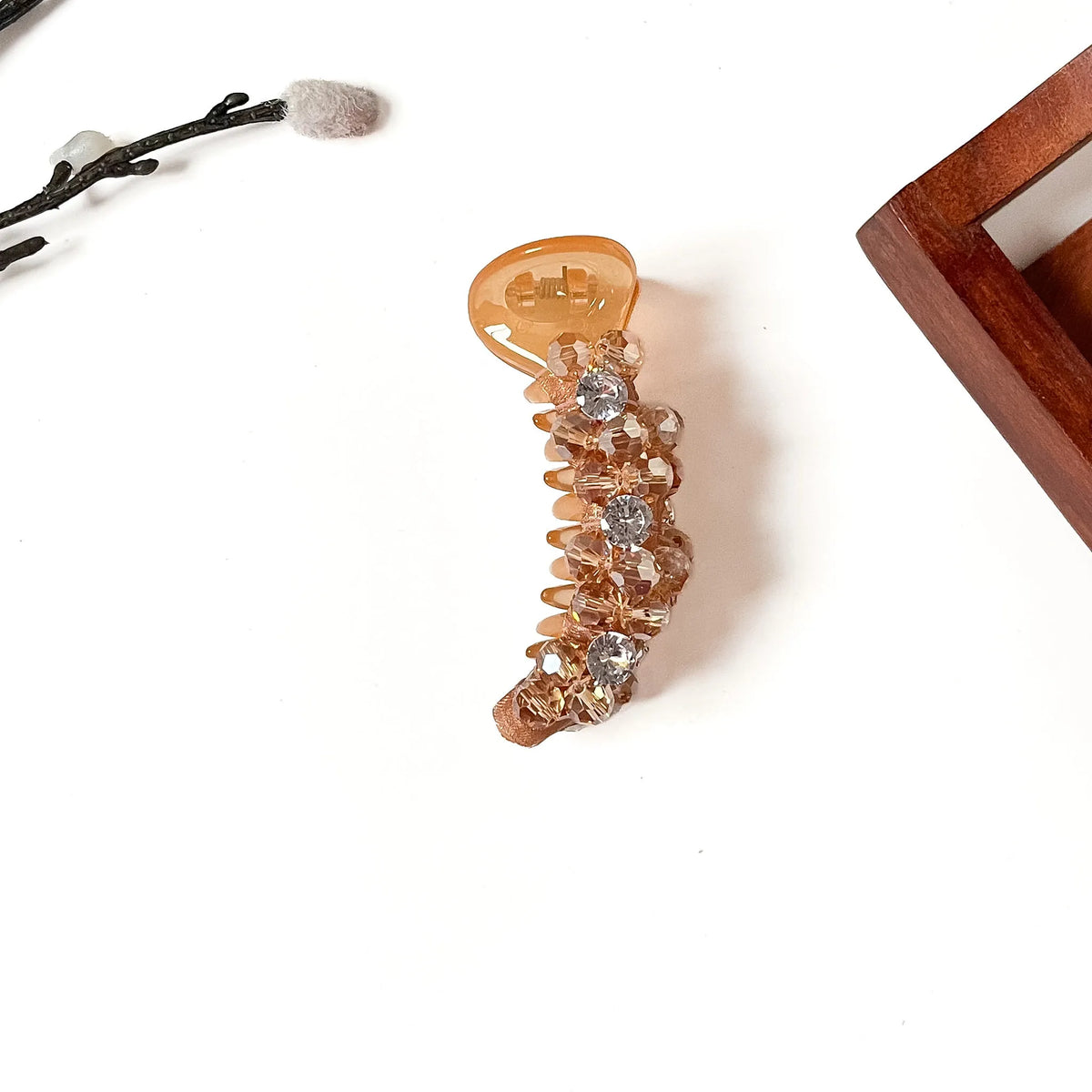Starlight Trio Banana Clip in champagne amber, 8cm crystal banana clutcher with golden beads and three rhinestones