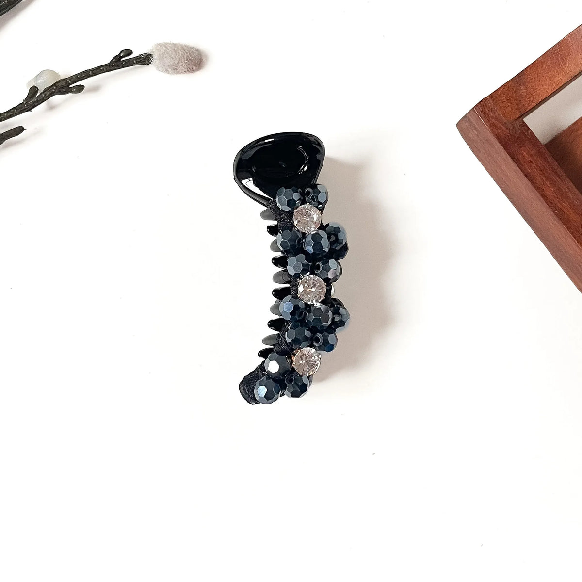 Starlight Trio Banana Clip in midnight black, 8cm crystal banana clutcher with black faceted beads and three rhinestones