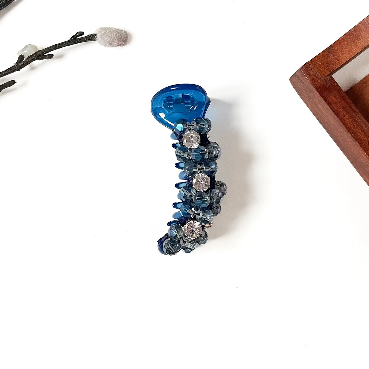 Starlight Trio Banana Clip in sapphire blue, 8cm crystal banana clutcher with smoky blue beads and three rhinestones