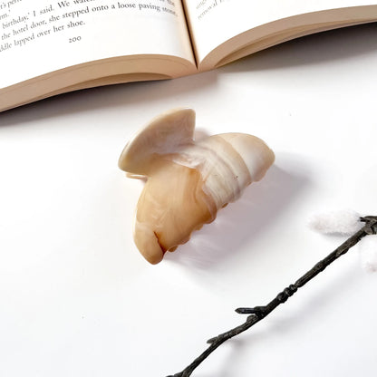 Beige swirled marble claw clip for buns and half-ups