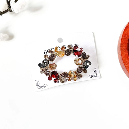 Harvest multicolour butterfly barrette with burgundy, champagne and grey stones, a jeweled hair clip