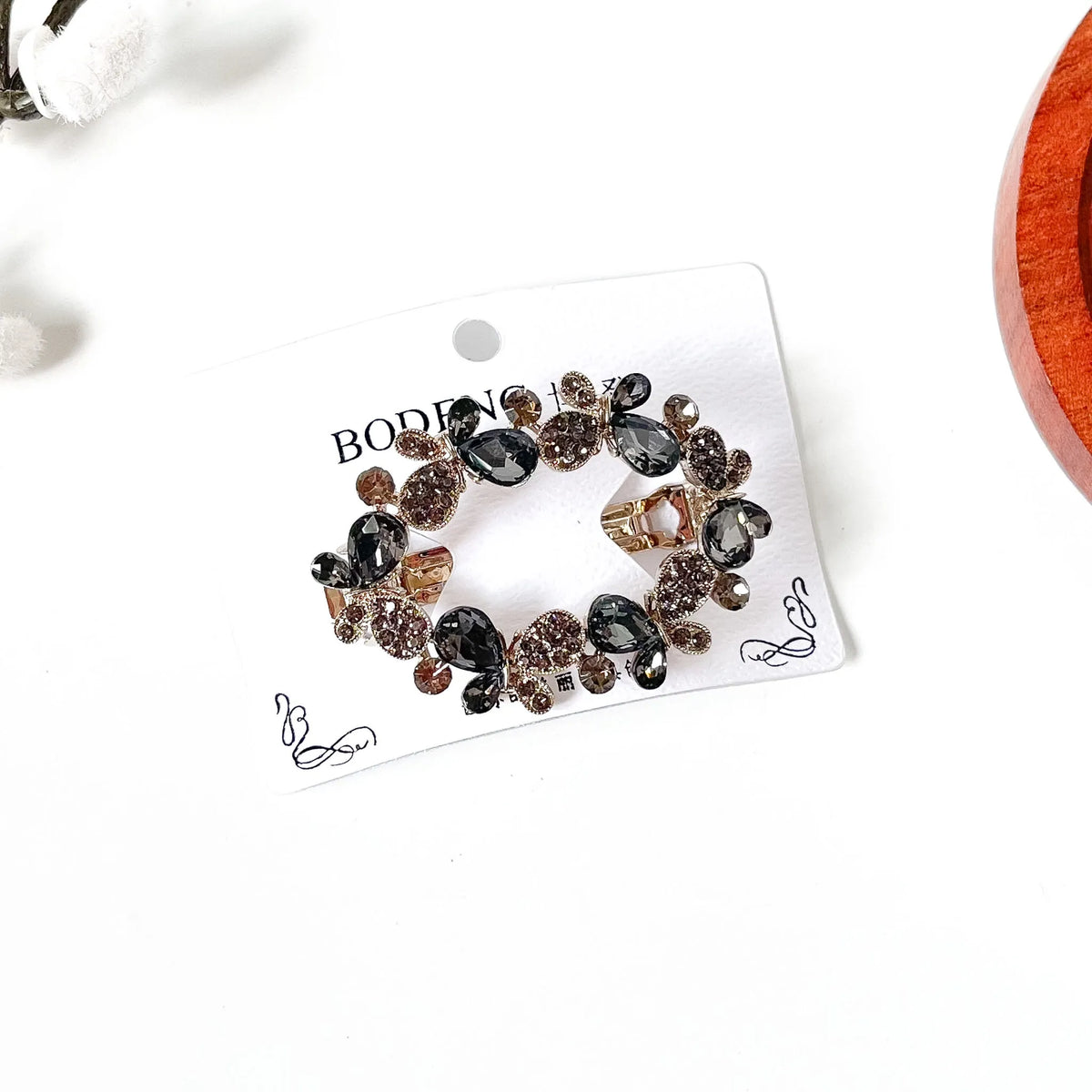 Slate grey crystal butterfly barrette with rhinestone wings, a stone center clip for buns