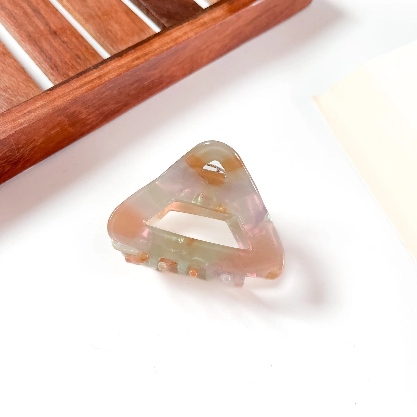 Peach marble triangle claw clip for hair