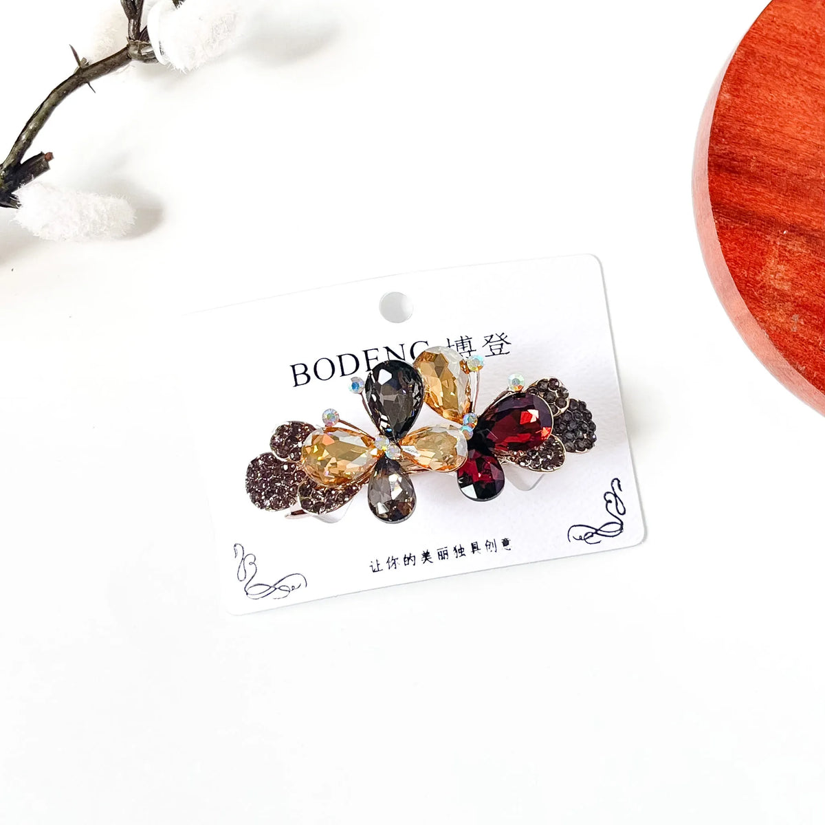 Harvest multicolour butterfly hair clip with champagne, smoky grey and burgundy crystals, a cute side barrette