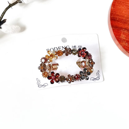 Harvest multicolour flower barrette with champagne, burgundy and grey crystals, a floral center clip