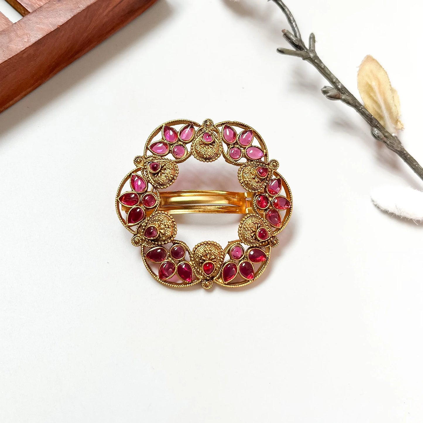 Ruby gemstone wreath rosette barrette with eight ornate sections in circular formation, antique gold 4cm